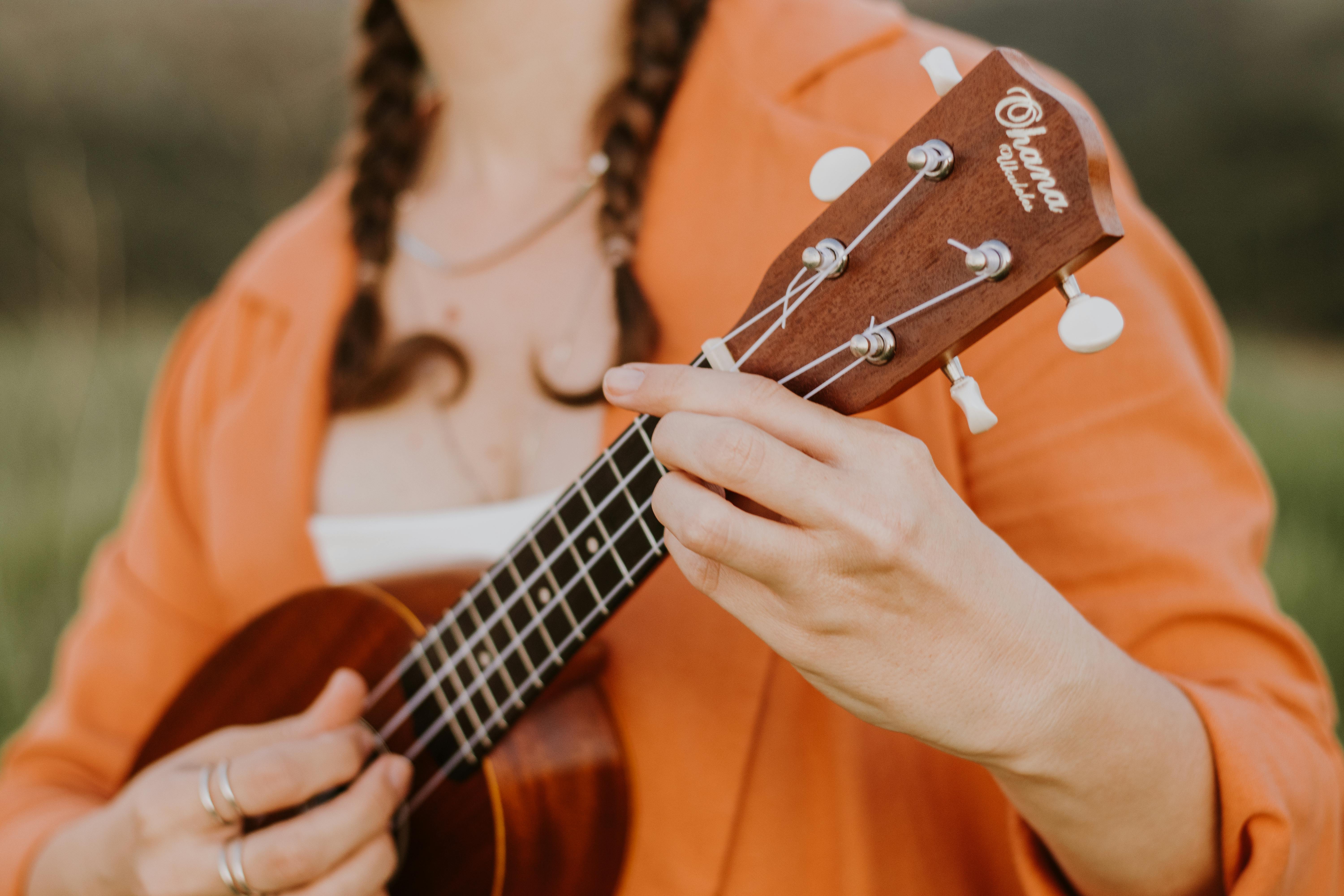 A Woman Playing Ukulele