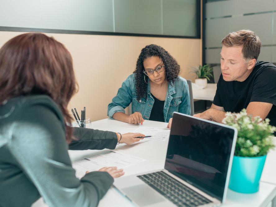 A Couple Talking with an Estate Planner