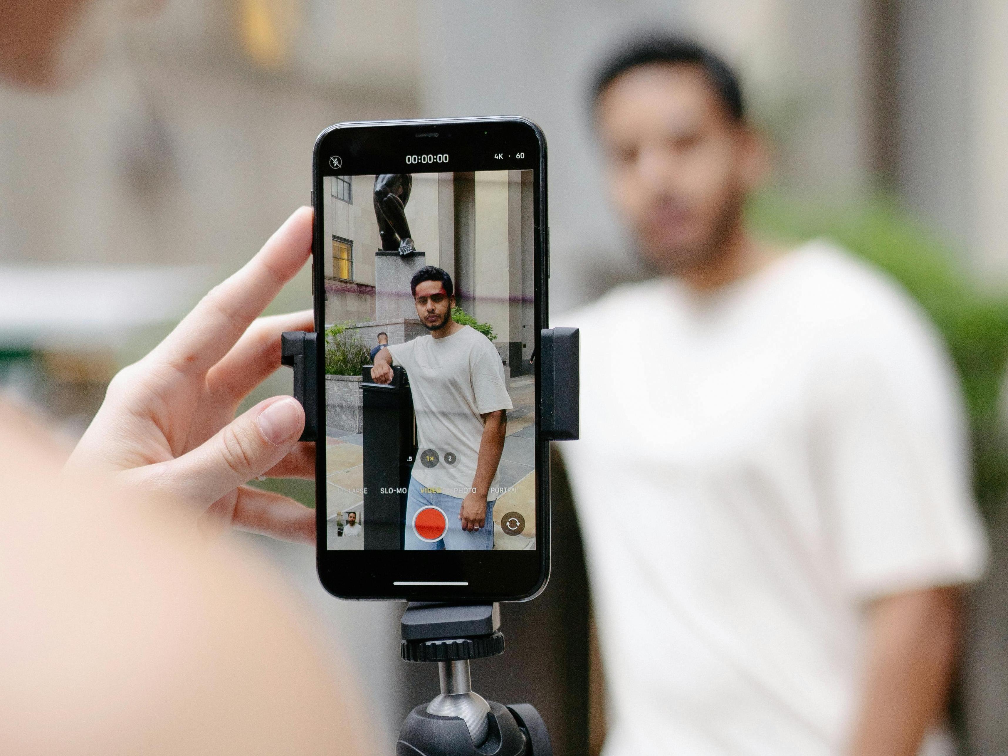 A Woman Shooting a Smartphone Video