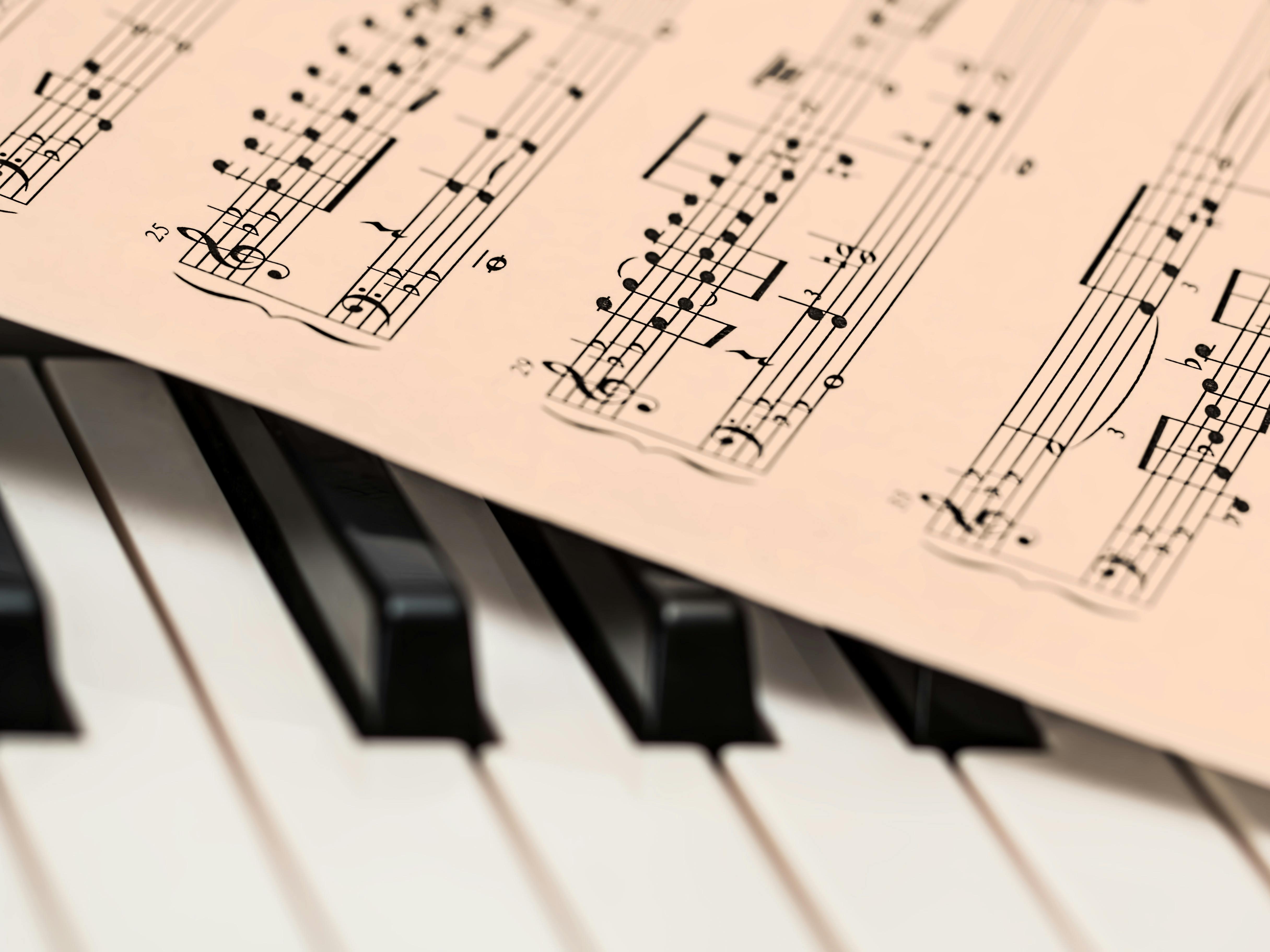 Piano Keyboard and Sheet Music