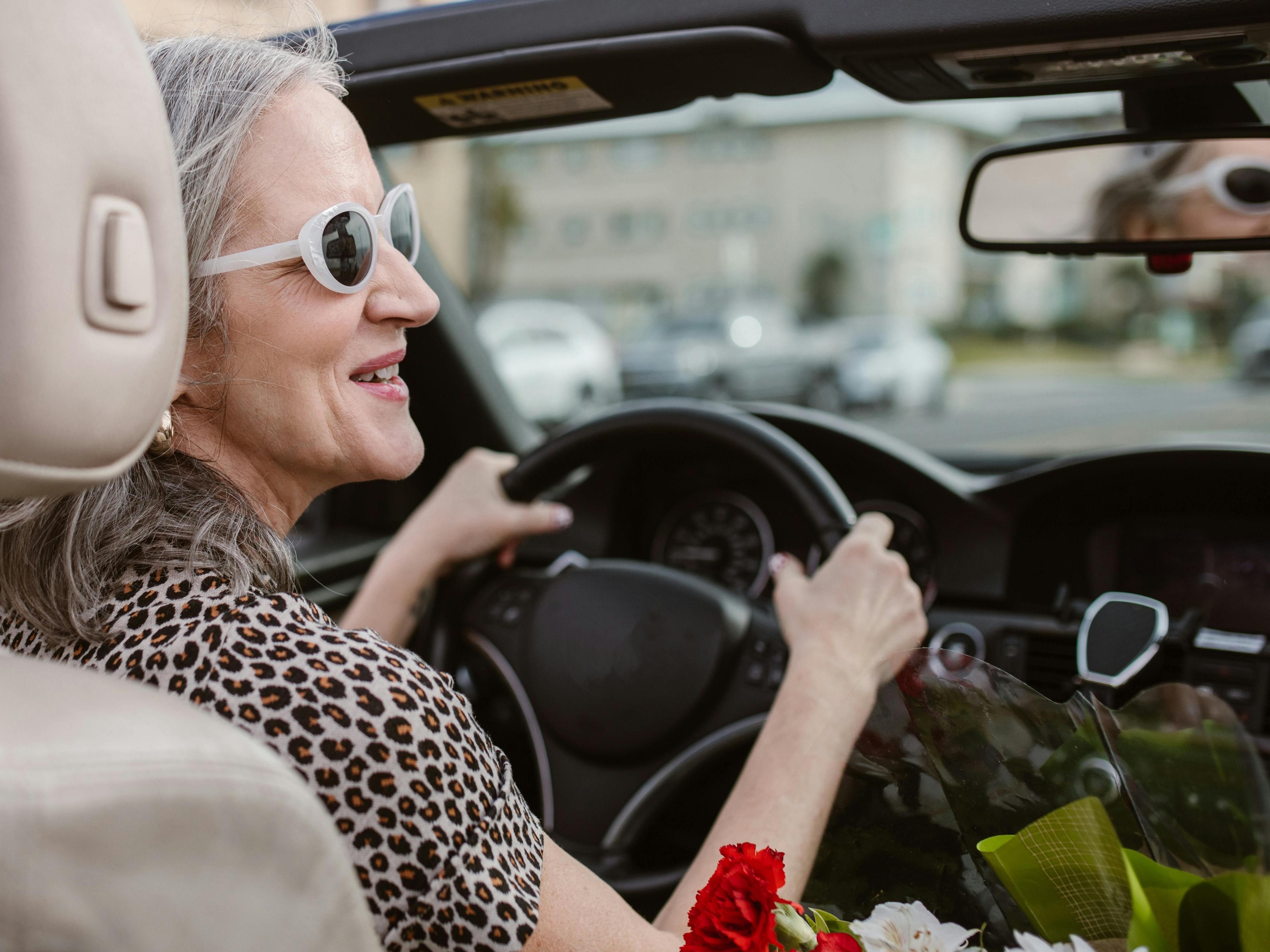 An Elderly Woman Driving